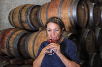 STELLENBOSCH, SOUTH AFRICA - MARCH 12: Independent South African winemaker Cathy Marshall, who founded who founded her namesake winery Catherine Marshall Wines in 1997, tasting her barrel-aging 2019 vintage Pinot Noir wines on March 12, 2020 in the Stellenbosch wine region in the Western Cape province of South Africa. According to the biblical narrative, the first vintner was Noah who planted a vine after the floodwaters receded and since ancient times men have dominated viticulture and winemaking, like farming in general. Marshall is one of a growing band of women who have succeeded in recent years in closing the gender gap in the world of wine, both in South Africa and globally, with a blend of determination, passion, a keen palate and an ability to think creatively. (Photo by David Silverman/Getty Images)