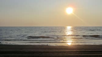 sunrise in Sottomarina/Veneto/Italy, reflection of the sun on the sea - alba a Sottomarina/Veneto/Italia, riflesso del sole sul mare