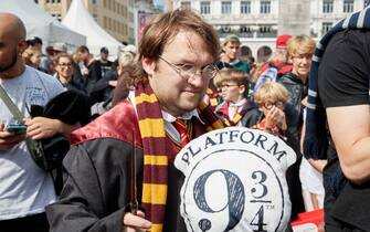 26 August 2023, Hamburg: Axel Bernhard from Argentina, music teacher, comes dressed as Harry Potter to the City Hall Market. Harry Potter celebrated the 25th anniversary with a world record attempt at the Rathausmarkt. More than 997 people dressed as Harry Potter were needed in the square to break the current record. Photo: Georg Wendt/dpa (Photo by Georg Wendt/picture alliance via Getty Images)