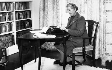 English detective novelist, Agatha Christie (1890 - 1976) typing at her home, Greenway House, Devon, January 1946.