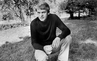Czech writer Milan Kundera poses in a garden in Prague 14 October 1973. Novelist born in Brno, Czech Republic, Kundera lectured in Cinematographic studied in Prague until he lost his post after the Russian invasion in 1968. His first novel, Zert (1967, The Joke), was a satire on Czechoslovakian-style Stalinism. In 1975 he fled to Paris, where he has lived ever since, taking French nationality in 1981. He came to prominence in the West with his "The book of Laughter and Forgetting" in 1979, and "The Unbearable Lightness of Being" in 1984 which was filmed in 1987.
(FILM)  AFP PHOTO (Photo by AFP) (Photo by -/AFP via Getty Images)