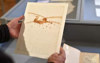A drawing by Frenchman Antoine de Saint-ExupÃ©ry is shown at the Museum of Old Toulouse on May 17, 2017, prior to the set of 12 drawings and 7 letters by Saint-ExupÃ©ry are auctioned in Paris on June 14. 
He is best remembered for his novella The Little Prince (Le Petit Prince).  / AFP PHOTO / REMY GABALDA / RESTRICTED TO EDITORIAL USE - MANDATORY MENTION OF THE ARTIST UPON PUBLICATION - TO ILLUSTRATE THE EVENT AS SPECIFIED IN THE CAPTION        (Photo credit should read REMY GABALDA/AFP via Getty Images)