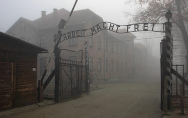 epa08966068 A handout photo made available by the Auschwitz Memorial and Museum shows the 'Arbeit macht Frei' gate ('Work sets free) at the former German Nazi concentration and extermination camp Auschwitz I in Oswiecim, Poland, 21 November 2006 (reissued 26 January 2021). The 76th anniversary of the liberation of the largest German Nazi concentration and death camp on 27 January 1945, will be commemorated online due to the coronavirus Covid-19 pandemic, with online broadcast and discussion panels focused on the fate of children in Auschwitz. The liberation of the Auschwitz-Birkenau is commemorated as International Holocaust Remembrance Day worldwide. The biggest German Nazi death camp KL Auschwitz-Birkenau was a complex of over 40 concentration and extermination camps operated by Nazi Germany near Oswiecim in occupied Poland during World War II, and a central site in the Nazis' plan to the so-called 'Final Solution' and the Holocaust (Shoa). It is estimated that 1.3 million people were sent to Auschwitz, and 1.1 million died there including 960,000 Jews, 74,000 non-Jewish Poles, 21,000 Roma people, 15,000 Soviet prisoners of war, and up to 15,000 other Europeans. Prisoners who were not gassed in chambers died of starvation, exhaustion, disease, individual executions, beatings or were killed during medical experiments. According to data from Auschwitz memorial,  at least 232,000 children and young people were deported to Auschwitz, of whom 216,000 were Jews, 11,000 Roma, about 3,000 Poles, more than 1,000 Belarusians, and several hundred Russians, Ukrainians, and others. A total of about 23,000 children and young people were registered in the camp. Slightly more than 700 were liberated on the territory of Auschwitz in January 1945.  EPA/PAWEL SAWICKI / www.auschwitz.or  HANDOUT EDITORIAL USE ONLY/NO SALES *** Local Caption *** 55790124
