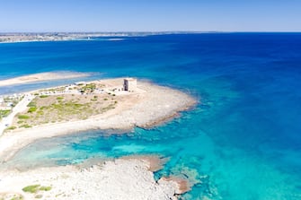 Aerial view of the lookout tower Torre Chianca by the sea, Torre Lapillo, Porto Cesareo, Lecce province, Salento, Apulia, Italy
