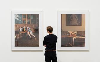A man looks at artworks entitled "Untitled (Claudia Schiffer series)" by Austrian artist Erwin Wurm, displayed at the "Performing for the Camera" exhibition at the Tate Modern gallery in London on February 16, 2016.
The exhibition, said to examine the relationship between photography and performance, is set to run from February 18 - June 12, 2016. / AFP / LEON NEAL / RESTRICTED TO EDITORIAL USE - MANDATORY MENTION OF THE ARTIST UPON PUBLICATION - TO ILLUSTRATE THE EVENT AS SPECIFIED IN THE CAPTION        (Photo credit should read LEON NEAL/AFP via Getty Images)