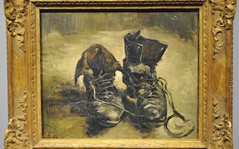 The painting "Shoes" by Dutch artist Vincent van Gogh is on display at the Wallraf-Richartz Museum in the western German city of Cologne on September 16, 2009. The painting from the year 1886 is on loan from the Van Gogh Museum in Amsterdam until January 10, 2010. AFP PHOTO DDP / HENNING KAISER GERMANY OUT (Photo credit should read HENNING KAISER/DDP/AFP via Getty Images)