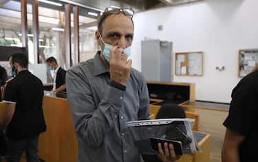epa09512492 Shmuel Peleg, the maternal grandfather of six-year-ol Eitan Biran, the sole survivor of a deadly cable car crash in Italy last May, arrives at the Justice Court for a second hearing in Eitan's custody case, in Tel Aviv, Israel, 08 October 2021. Eitan's parents and brother, along with 11 other people, died on 23 May 2021 when the Stresa-Alpino-Mottarone Cable Car crashed after a traction cable snapped. Peleg took young Eitan to Israel without the permission of his Italian family, who accuse the Israeli grandfather of kidnapping the six-year-old.  EPA/ABIR SULTAN