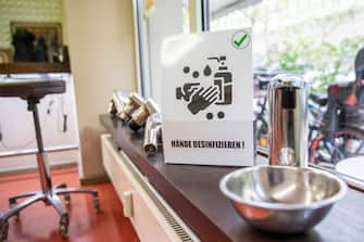 BERLIN, GERMANY - MAY 04:  A disinfectant gel stands at a hair salon that opened today for the first time since March during the novel coronavirus (Covid-19) crisis on May 4, 2020 in Berlin, Germany. Barber shops and hair salons are reopening this week nationwide as authorities carefully lift lockdown measures that had been imposed to stem the spread of the virus. (Photo by Maja Hitij/Getty Images)