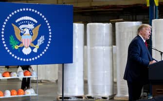 US President Donald Trump speaks to people at a Honeywell International Inc. factory during his first trip since widespread COVID-19 related lockdowns went into effect May 5, 2020, in Phoenix, Arizona. (Photo by Brendan Smialowski / AFP) (Photo by BRENDAN SMIALOWSKI/AFP via Getty Images)