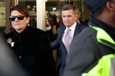 WASHINGTON, DC - DECEMBER 18: Former White House National Security Advisor Michael Flynn and his wife Lori Andrade leave the Prettyman Federal Courthouse following a sentencing hearing in U.S. District Court December 18, 2018 in Washington, DC. Flynn's lawyers accepted the judge's offer to delay sentencing for lying to the FBI about his communication with former Russian Ambassador Sergey Kislyak. Special Prosecutor Robert Mueller has recommended no prison time for Flynn due to his cooperation with the investigation into Russian interference in the 2016 presidential election. (Photo by Chip Somodevilla/Getty Images)