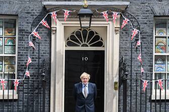 LONDON, ENGLAND  - MAY 08: British Prime Minister Boris Johnson is seen outside Number 10 Downing Street on May 8, 2020 in London, United Kingdom.The UK commemorates the 75th Anniversary of Victory in Europe Day (VE Day) with a pared-back rota of events due to the coronavirus lockdown. On May 8th, 1945 the Allied Forces of World War II celebrated the formal acceptance of surrender of Nazi Germany. (Photo by Peter Summers/Getty Images)