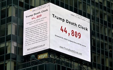 NEW YORK, NEW YORK - MAY 08: A Trump Death Clock which calculates the portion of U.S. COVID-19 deaths caused by President Trump’s delayed response to the coronavirus pandemic was unveiled by Eugene Jarecki in Times Square during the coronavirus pandemic on May 08, 2020 in New York City. COVID-19 has spread to most countries around the world, claiming over 271,000 lives and infecting nearly 4 million people. (Photo by Dia Dipasupil/Getty Images)