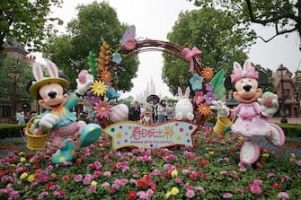 SHANGHAI, CHINA - MAY 11: Tourists visit Shanghai Disneyland after its reopening on May 11, 2020 in Shanghai, China. Shanghai Disneyland has reopened its gates following months of shutdown, offering a potential model for other mass entertainment venues around the world to open for business during the pandemic. (Photo by Hu Chengwei/Getty Images)