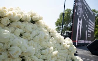 MoveOn.org stages a protest against the handling of the COVID-19 coronavirus pandemic by US President Donald Trump with white roses to remember the people who died from the disease, near the US Capitol in Washington, DC, May 13, 2020. (Photo by SAUL LOEB / AFP) (Photo by SAUL LOEB/AFP via Getty Images)