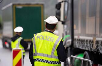 epa08418764 (FILE) - A police checkpoint slows down trucks on the A12 motorway near Ebbs, Austria, 29 July 2019 (reissued 13 May 2020). Media reports state on 13 May 2020 that Germany is planning to partially ease border controls as early as 16 May 2020, following a decision of the Cabinet. At the same time, Austria is planning to reopen the border with Germany as early as 15 June, media added.  EPA/LUKAS BARTH-TUTTAS *** Local Caption *** 55368926