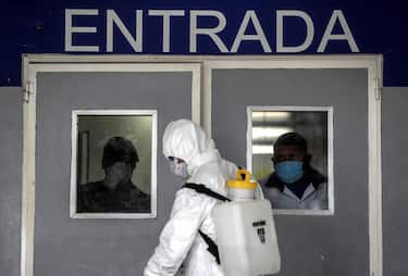 epa08406050 Members of the Brazilian army are working on the disinfection of the Pronto Medical Care Unit (UPA), in Rio de Janeiro, Brazil, 06 May 2020. Brazil has reached 114,715 cases and 7,921 deaths.  EPA/Antonio Lacerda