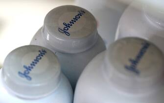 SAN ANSELMO, CALIFORNIA - OCTOBER 18: Containers of Johnson's baby powder made by Johnson and Johnson sits on a shelf at Jack's Drug Store on October 18, 2019 in San Anselmo, California. Johnson & Johnson, the maker of Johnson's baby powder, announced a voluntary recall of 33,000 bottles of baby powder after federal regulators found trace amounts of asbestos in a single bottle of the product.  (Photo Illustration by Justin Sullivan/Getty Images)