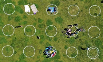 SAN FRANCISCO, CALIFORNIA - MAY 20: In an aerial view by drone, new social distancing circles are shown at Dolores Park on May 20, 2020 in San Francisco, California. The move follows similar efforts by other parks in cities around the world in an effort to get back to some semblance of normalcy.  (Photo by Justin Sullivan/Getty Images)