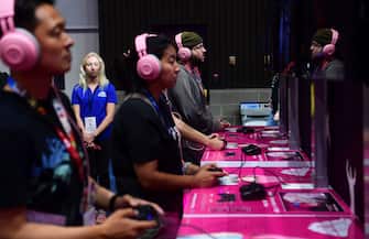 Gaming fans play "Catherine: Fullbody" from Atlus at the 2019 Electronic Entertainment Expo, also known as E3, on June 12, 2019 in Los Angeles, California. - Gaming fans and developers gather, connecting thousands of the brightest, best and most innovative in the interactive entertainment industry and a chance for many to preview new games. (Photo by Frederic J. BROWN / AFP)        (Photo credit should read FREDERIC J. BROWN/AFP via Getty Images)