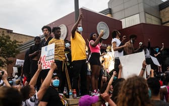 MINNEAPOLIS, MN - MAY 26: Protestors demonstrate outside the Third Precinct Police Station after the killing of George Floyd on May 26, 2020 in Minneapolis, Minnesota. Floyd was killed yesterday while in the custody of Minneapolis Police. (Photo by Stephen Maturen/Getty Images)