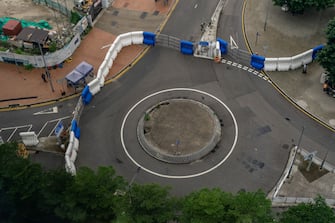 HONG KONG, CHINA - MAY 27:  Barricades are setup outside of Legislative Council Building ahead of the controversial national anthem law on May 27, 2020 in Hong Kong. Chinese Premier Li Keqiang said on Friday during the National People's Congress that Beijing would establish a sound legal system and enforcement mechanism for safeguarding national security in Hong Kong. (Photo by Anthony Kwan/Getty Images)