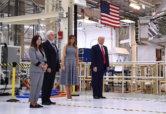 1215626389 (L-R) Karen Pence, US Vice President Mike Pence, First Lady Melania Trump and US President Donald Trump arrive at the Kennedy Space Center in Florida on May 27, 2020. - US President Donald Trump travels to Florida to see the historic first manned launch of the SpaceX Falcon 9 rocket with the Crew Dragon spacecraft, the first to launch from Cape Canaveral since the end of the space shuttle program in 2011. (Photo by Brendan Smialowski / AFP) (Photo by BRENDAN SMIALOWSKI/AFP via Getty Images)