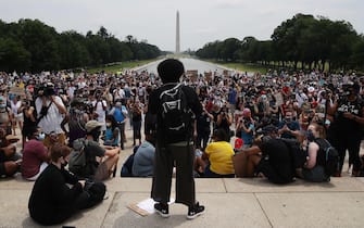 WASHINGTON, DC - JUNE 06: Demonstrators gather in front of the Lincoln Memorial during a protest against police brutality and racism on June 6, 2020 in Washington, DC. This is the 12th day of protests with thousands of people descending on the city to peacefully demonstrate in the wake of the death of George Floyd, a black man who was killed in police custody in Minneapolis on May 25.   Win McNamee/Getty Images/AFP
== FOR NEWSPAPERS, INTERNET, TELCOS & TELEVISION USE ONLY ==