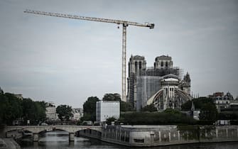 A picture shows the Notre-Dame Cathedral during the first day of the dismantling operations of the scaffolding in Paris on June 8, 2020 that was damaged in the April 15, 2019 blaze. (Photo by Philippe LOPEZ / AFP) (Photo by PHILIPPE LOPEZ/AFP via Getty Images)