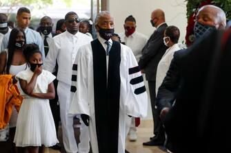 epa08475240 Rev. Al Sharpton enters the church during the funeral for George Floyd at The Fountain of Praise church in Houston, Texas, USA, 09 June 2020. A bystander's video posted online on 25 May, appeared to show George Floyd, 46, pleading with arresting officers that he couldn't breathe as an officer knelt on his neck. The unarmed Black man later died in police custody and all four officers involved in the arrest have been charged and arrested.  EPA/Godofredo A. Vasquez / POOL