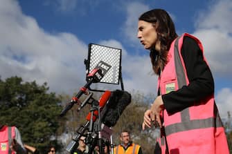 TAURANGA, NEW ZEALAND - JUNE 09: Prime Minister Jacinda Ardern speaks to the media after the visit to Trevelyanâ  s Kiwifruit and Avocado Packhouse on June 09, 2020 in Tauranga, New Zealand. COVID-19 restrictions were lifted from midnight as New Zealand moved to COVID-19 Alert Level 1 as the government confirmed there are zero active cases in the country. The lifting of restrictions under Alert Level 1 will see life mostly return to normal in New Zealand, however strict border measures will remain with mandatory isolation and quarantine for any overseas arrivals. New Zealanders are also being asked to keep diaries in the event of a second wave of infections. (Photo by Michael Bradley/Getty Images)