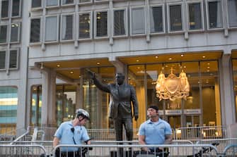PHILADELPHIA, PA - AUGUST 16: Police officers guard a statue of former Philadelphia mayor Frank Rizzo as protesters march against white supremacy August 16, 2017 in downtown Philadelphia, Pennsylvania. Detractors call the statue a symbol of white supremacy and want it taken down. Demonstrations are being held following clashes between white supremacists and counter-protestors in Charlottesville, Virginia over the weekend. (Photo by Jessica Kourkounis/Getty Images)