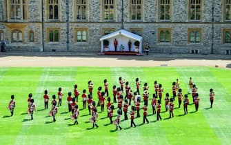 The Queen views a military ceremony in the Quadrangle of Windsor Castle to mark Her Majesty’s Official Birthday on Saturday 13th June, 2020.  The ceremony will be executed by soldiers from the 1st Battalion Welsh Guards, who are currently on Guard at Windsor Castle, and feature music performed by a Band of the Household Division.

 Camera Press Rota