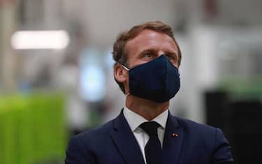 French President Emmanuel Macron wearing a protective face mask, visits a factory of manufacturer Valeo in Etaples, near Le Touquet, northern France, 26 May 2020 as part of the launch of a plan to rescue the French car industry.  ANSA/LUDOVIC MARIN / POOL  MAXPPP OUT