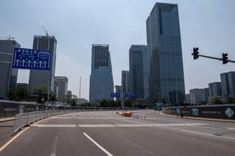 A general view shows a street without traffic in Beijing on June 19, 2020. - China reported 32 new cases of the coronavirus, with 25 more in Beijing where a new cluster has prompted fresh lockdowns and travel restrictions over the past week. (Photo by NICOLAS ASFOURI / AFP) (Photo by NICOLAS ASFOURI/AFP via Getty Images)