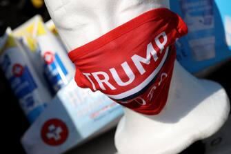 1250557912 TULSA, OKLAHOMA - JUNE 18: Trump 2020 face masks are shown for sale outside the BOK Center June 18, 2020 in Tulsa, Oklahoma. Trump is scheduled to hold his first political rally since the start of the coronavirus pandemic at the BOK Center on Saturday while infection rates in the state of Oklahoma continue to rise. (Photo by Win McNamee/Getty Images)