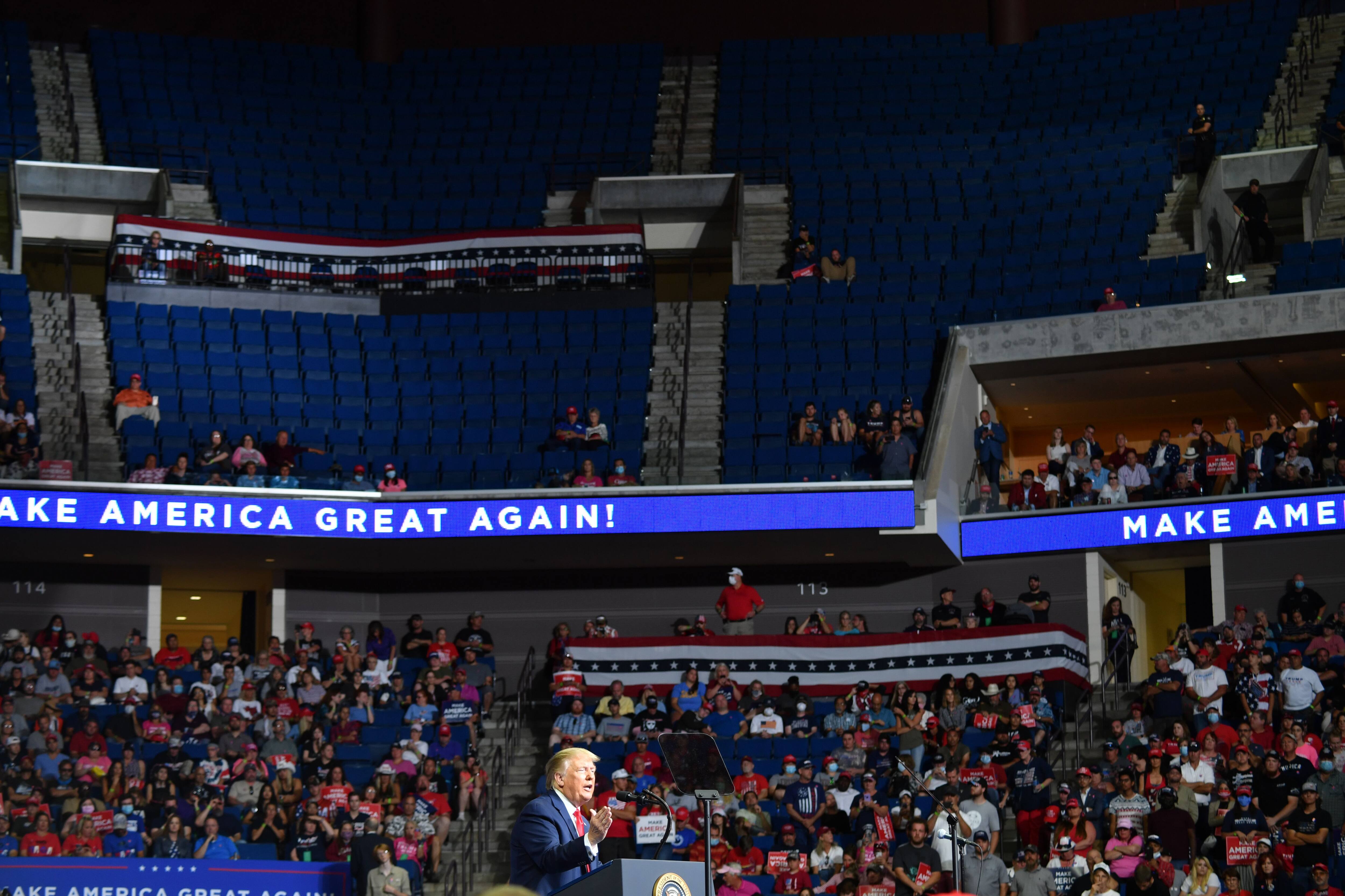 The upper section of the arena is seen partially empty as US President Donald Trump speaks during a campaign rally at the BOK Center on June 20, 2020 in Tulsa, Oklahoma. - Hundreds of supporters lined up early for Donald Trump's first political rally in months, saying the risk of contracting COVID-19 in a big, packed arena would not keep them from hearing the president's campaign message. (Photo by Nicholas Kamm / AFP) (Photo by NICHOLAS KAMM/AFP via Getty Images)