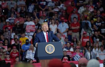 epa08499469 US President  Donald J. Trump speaks during a rally inside the Bank of Oklahoma Center in Tulsa, Oklahoma, USA, 20 June 2020. The campaign rally is the first since the COVID-19 pandemic locked most of the country down in March 2020.  EPA/ALBERT HALIM