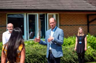 Britain's Prince William, Duke of Cambridge adheres to the Government's social distancing guidelines as he talks to staff at Oxford Vaccine Group's facility at Churchill Hospital in Oxford, west of London on June 24, 2020, during a visit to learn more about the group's work to establish a viable vaccine against the novel coronavirus COVID-19. (Photo by Steve Parsons / POOL / AFP) (Photo by STEVE PARSONS/POOL/AFP via Getty Images)