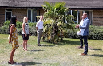 Britain's Prince William, Duke of Cambridge adheres to the Government's social distancing guidelines as he talks to staff at Oxford Vaccine Group's facility at Churchill Hospital in Oxford, west of London on June 24, 2020, during a visit to learn more about the group's work to establish a viable vaccine against the novel coronavirus COVID-19. (Photo by Steve Parsons / POOL / AFP) (Photo by STEVE PARSONS/POOL/AFP via Getty Images)