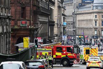 GLASGOW, SCOTLAND - JUNE 26: A general view of emergency services at the scene after reports of three people being killed in a central Glasgow hotel on June 26, 2020 in Glasgow, Scotland. A knifeman stabbed three people to death in the stairwell of the Park Inn Hotel on West George Street, Glasgow before being shot himself by armed police. The Scottish Police Federation (SPF) said an officer was stabbed during the major incident. (Photo by Jeff J Mitchell/Getty Images)