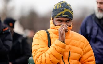 PARIS, FRANCE - JANUARY 17: Frank Ocean wears an orange puffer jacket, a beanie hat from Arc'Teryx, outside Louis Vuitton, during Paris Fashion Week - Menswear F/W 2019-2020,  on January 17, 2019 in Paris, France. (Photo by Edward Berthelot/Getty Images)