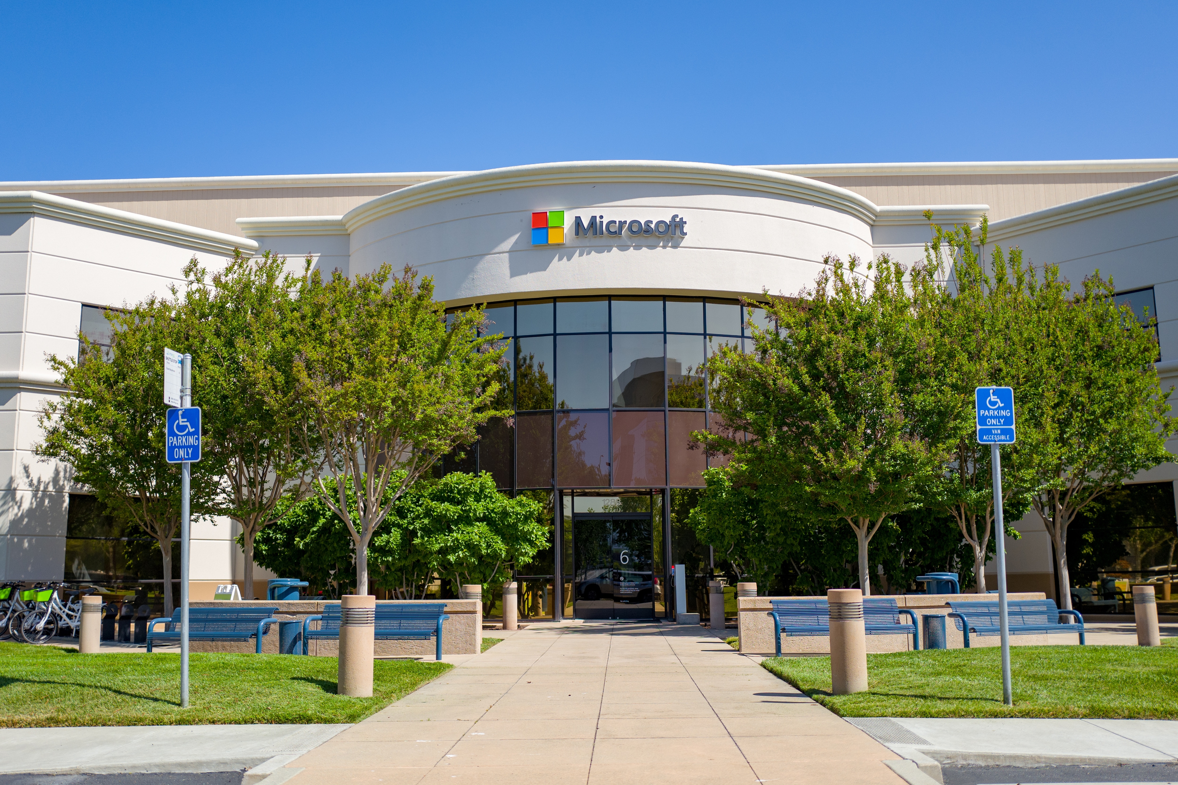 Facade with sign and logo at regional headquarters of computing company Microsoft in the Silicon Valley, Mountain View, California, May 3, 2019. (Photo by Smith Collection/Gado/Getty Images)