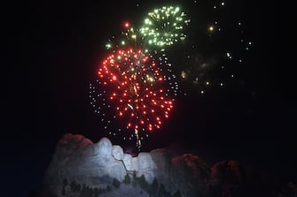 Fireworks explode above the Mount Rushmore National Monument during an Independence Day event attended by the US president in Keystone, South Dakota, July 3, 2020. (Photo by SAUL LOEB / AFP) (Photo by SAUL LOEB/AFP via Getty Images)