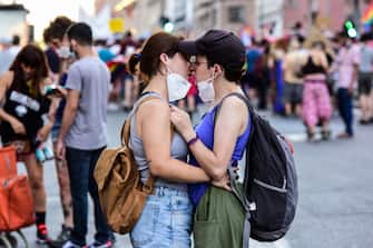 MADRID, SPAIN - JUNE 28: Two attendees kiss during the Alternative Gay Pride on June 28, 2020 in Madrid, Spain. Alternative Pride is a movement against "pink capitalism" and the commercialization of gay pride events. This year, the traditional Madrid Pride parade will be all digital due to the coronavirus (COVID-19) pandemic. (Photo by Ely Pineiro/Getty Images)