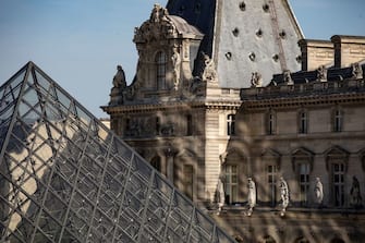 A picture taken on June 23, 2020 shows the Louvre pyramid by Chinese architect Ieoh Ming Pei, the entrance to the Louvre Museum in Paris. - The Louvre museum will reopen its doors on July 6, 2020, after months of closure due to lockdown measures linked to the COVID-19 pandemic, caused by the novel coronavirus. The coronavirus crisis has already caused "more than 40 million euros in losses" at the Louvre, announced its president and director Jean-Luc Martinez, who advocates a revival through "cultural democratization" and is preparing a "transformation plan" for the upcoming Olympic Games in 2024. (Photo by THOMAS SAMSON / AFP) / RESTRICTED TO EDITORIAL USE - MANDATORY MENTION OF THE ARTIST UPON PUBLICATION - TO ILLUSTRATE THE EVENT AS SPECIFIED IN THE CAPTION (Photo by THOMAS SAMSON/AFP via Getty Images)