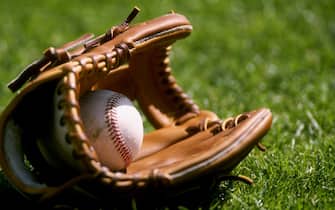 4 Mar 1998: A general view of a baseball laying in a glove on the grass during an Arizona Diamondbacks spring training game against the Chicago Cubs at Hohkam Stadium in Mesa, Arizona. The Diamondbacks defeated the Cubs 9-8.