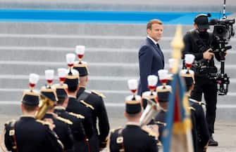 French President Emmanuel Macron reviews the guard of honour during the annual Bastille Day military ceremony on the Place de la Concorde in Paris, on July 14, 2020. - France holds a reduced version of its traditional Bastille Day parade this year due to safety measures over the COVID-19 (novel coronavirus) pandemic, and with the country's national day celebrations including a homage to health workers and others fighting the outbreak. (Photo by Thomas SAMSON / AFP) (Photo by THOMAS SAMSON/AFP via Getty Images)