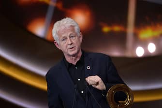 1193793685 LONDON, ENGLAND - DECEMBER 13: Richard Curtis accepts the Global Citizen of the Year Prize at the 2019 Global Citizen Prize at the Royal Albert Hall on December 13, 2019 in London, England. (Photo by Jeff Spicer/Getty Images for Global Citizen)