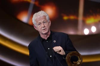 LONDON, ENGLAND - DECEMBER 13: Richard Curtis accepts the Global Citizen of the Year Prize at the 2019 Global Citizen Prize at the Royal Albert Hall on December 13, 2019 in London, England. (Photo by Jeff Spicer/Getty Images for Global Citizen)