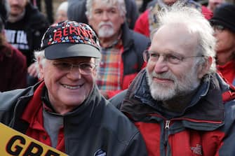 WASHINGTON, DC - NOVEMBER 08: Ben Cohen and Jerry Greefield, co-founders of Ben and Jerry's, join about 20 people sitting in front of the White House northwest gate as part of a "Fire Drill Fridays" rally protesting climate change November 08, 2019 in Washington, DC. The demonstrators marched from the U.S. Capitol to the White House where they temporarily blocked the northwest gate before ending the protest and eating free ice cream.  (Photo by Chip Somodevilla/Getty Images)